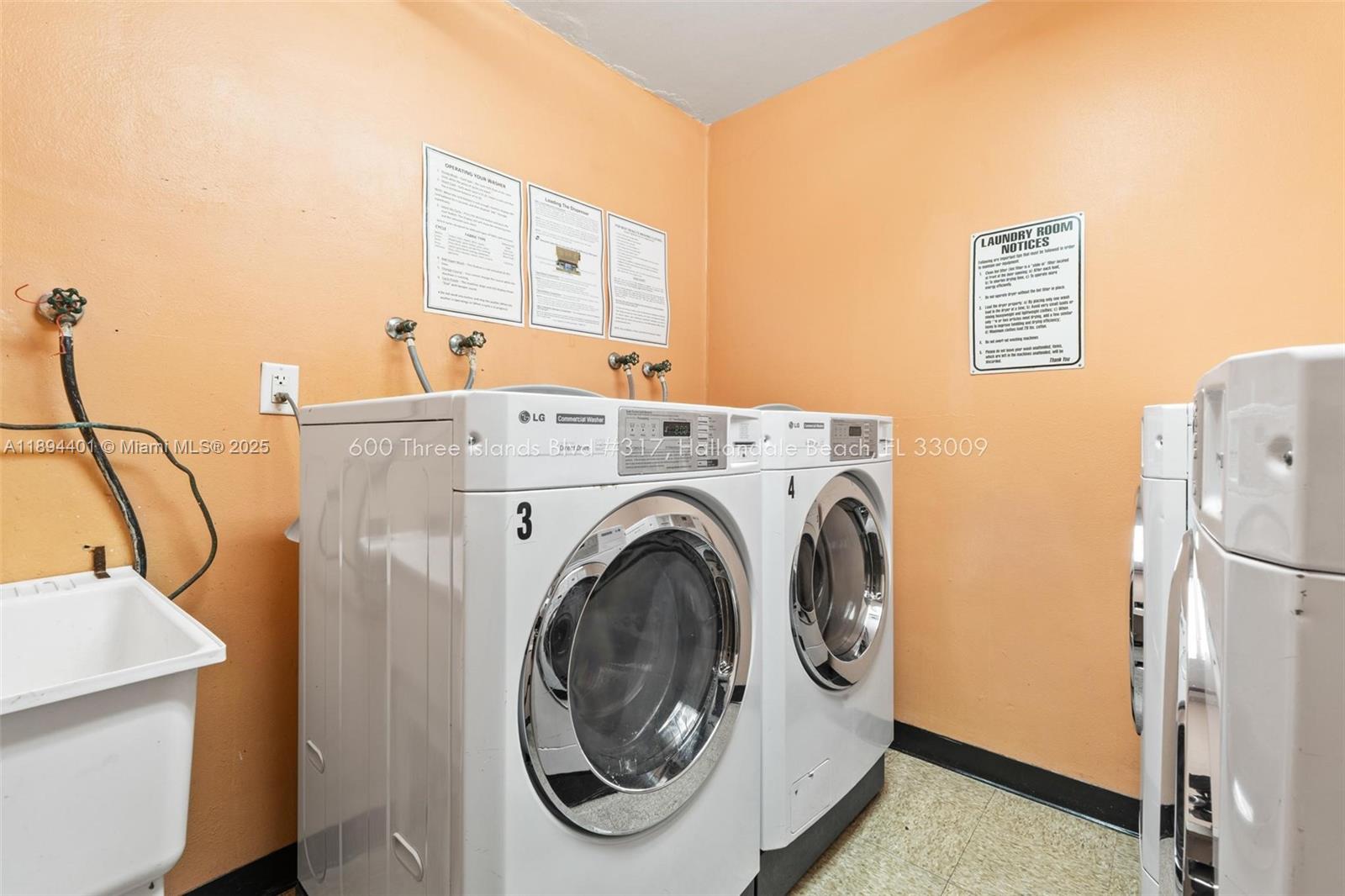 Photo of 600 Three Islands Blvd  #317, Hallandale Beach, Florida, 33009 - Common same-floor laundry, around the corner from the condo