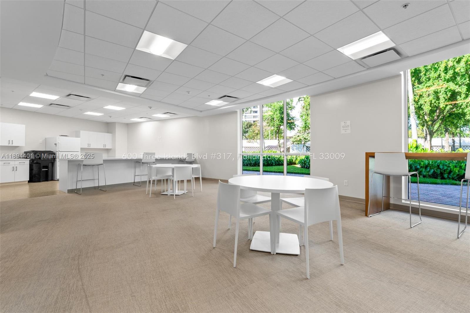 Photo of 600 Three Islands Blvd  #317, Hallandale Beach, Florida, 33009 - Community kitchen and recreation room