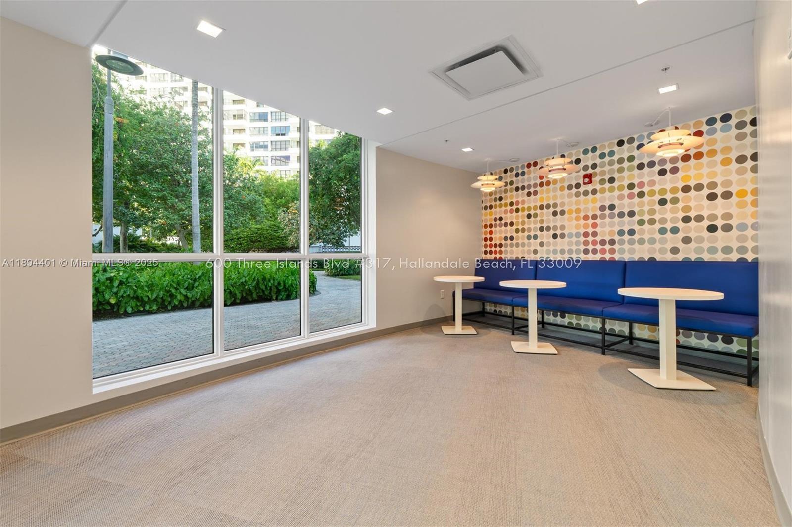 Photo of 600 Three Islands Blvd  #317, Hallandale Beach, Florida, 33009 - Community fitness center sitting area