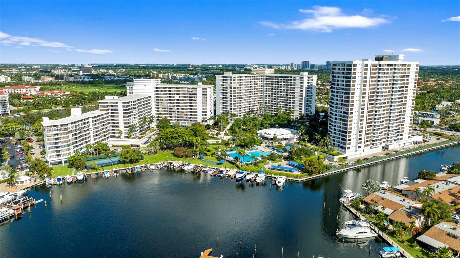 Photo of 600 Three Islands Blvd  #317, Hallandale Beach, Florida, 33009 - Overview of Olympus Condo, grounds and marina, overlooking the intracoastal