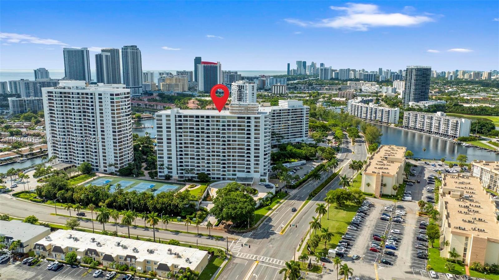 Photo of 600 Three Islands Blvd  #317, Hallandale Beach, Florida, 33009 - Overview of Olympus Condo from Parkview Avenue and Three Islands Boulevard intersection