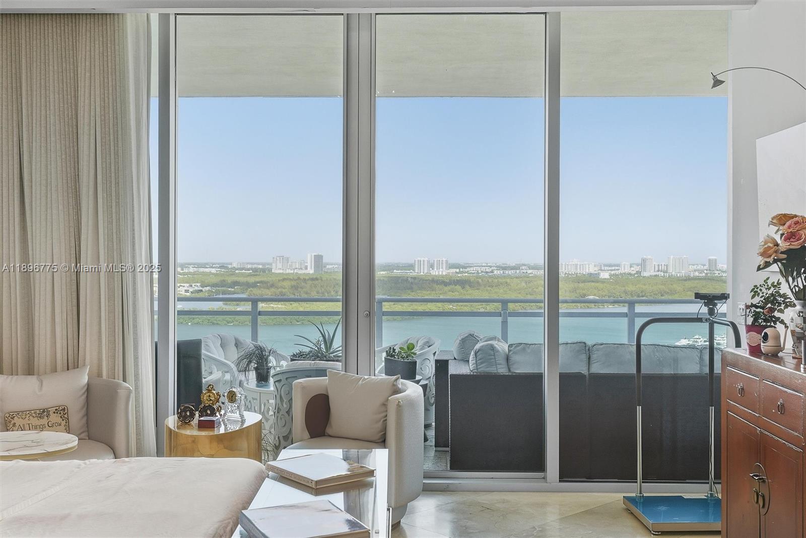 Photo of 10295 Collins Ave  #2207, Bal Harbour, Florida, 33154 - Master bedroom with NW view balcony access