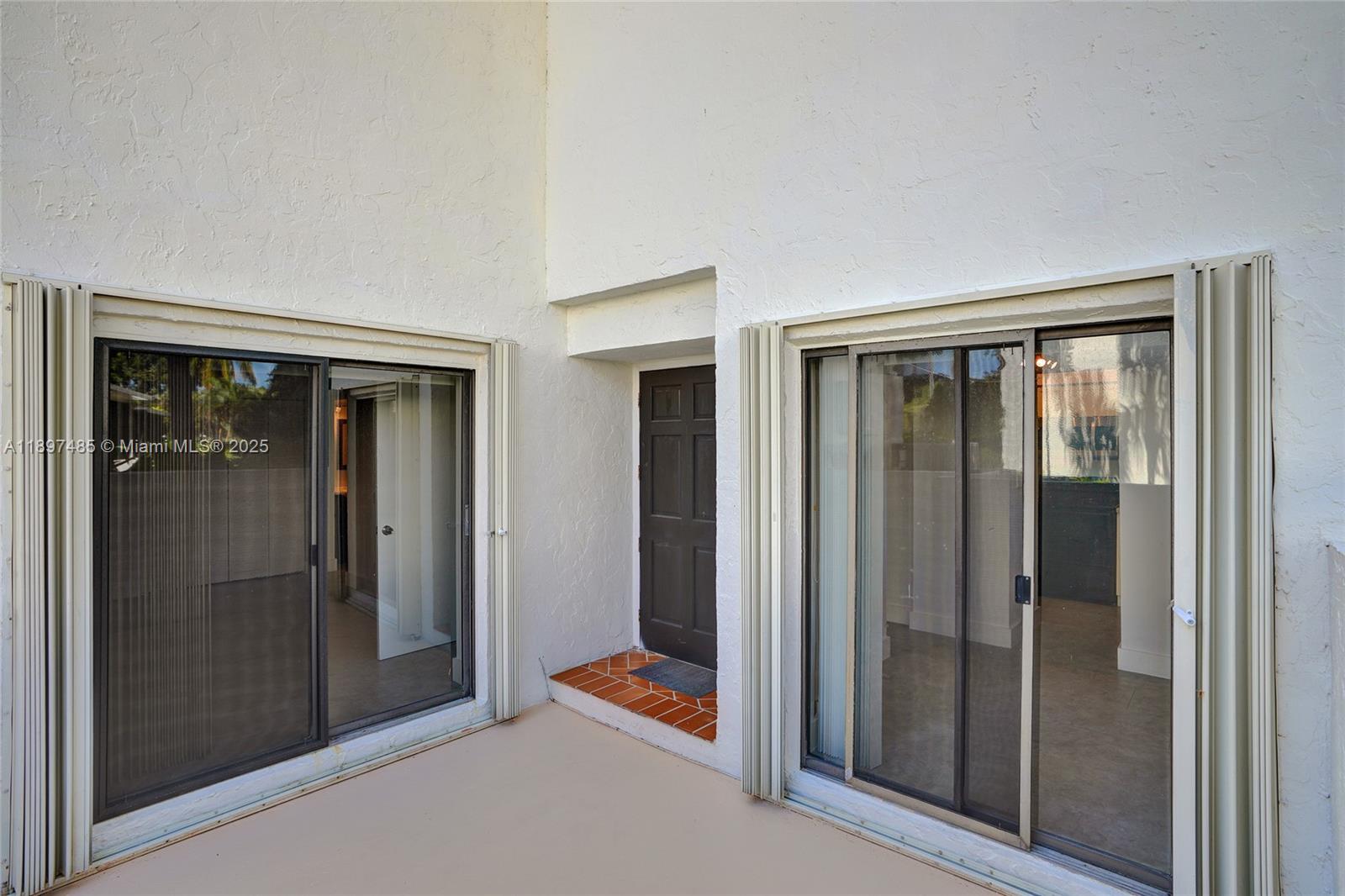 Photo of 20332 34th Ct (20332), Aventura, Florida, 33180 - Shutters on private front entry