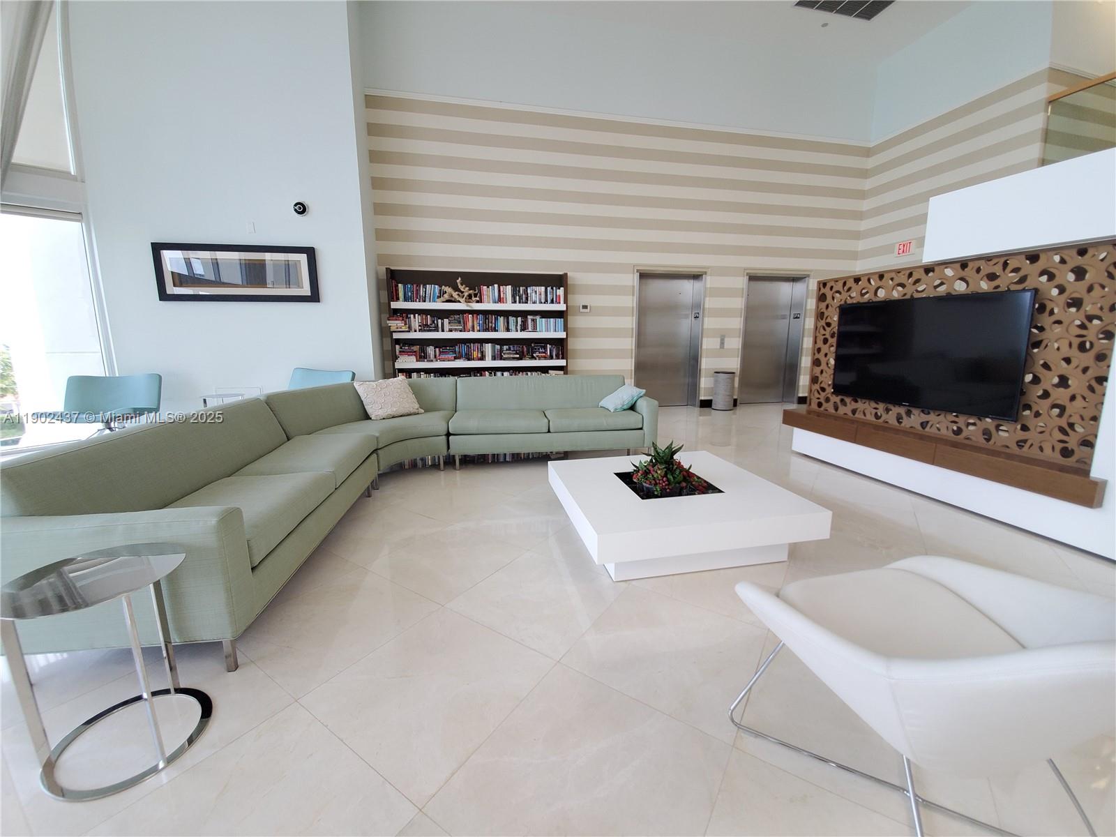 Photo of 19333 Collins Ave #909, Sunny Isles Beach, Florida, 33160 - Library - Social Room