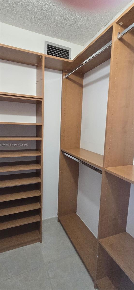 Photo of 400 Kings Point Dr  #624, Sunny Isles Beach, Florida, 33160 - Master closet