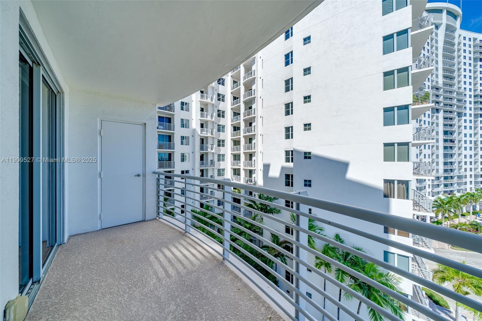 Photo of 1830 Radius Dr  #823, Hollywood, Florida, 33020 - living room balcony, above courtyard cascade