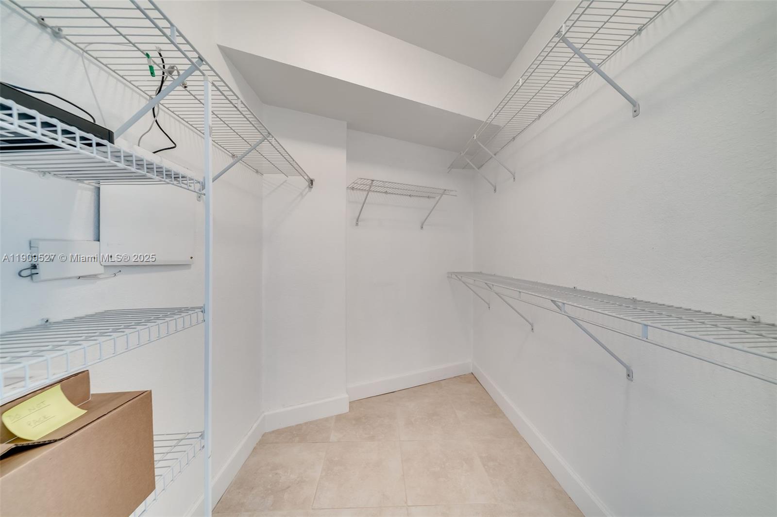Photo of 1830 Radius Dr  #823, Hollywood, Florida, 33020 - master walk in closet