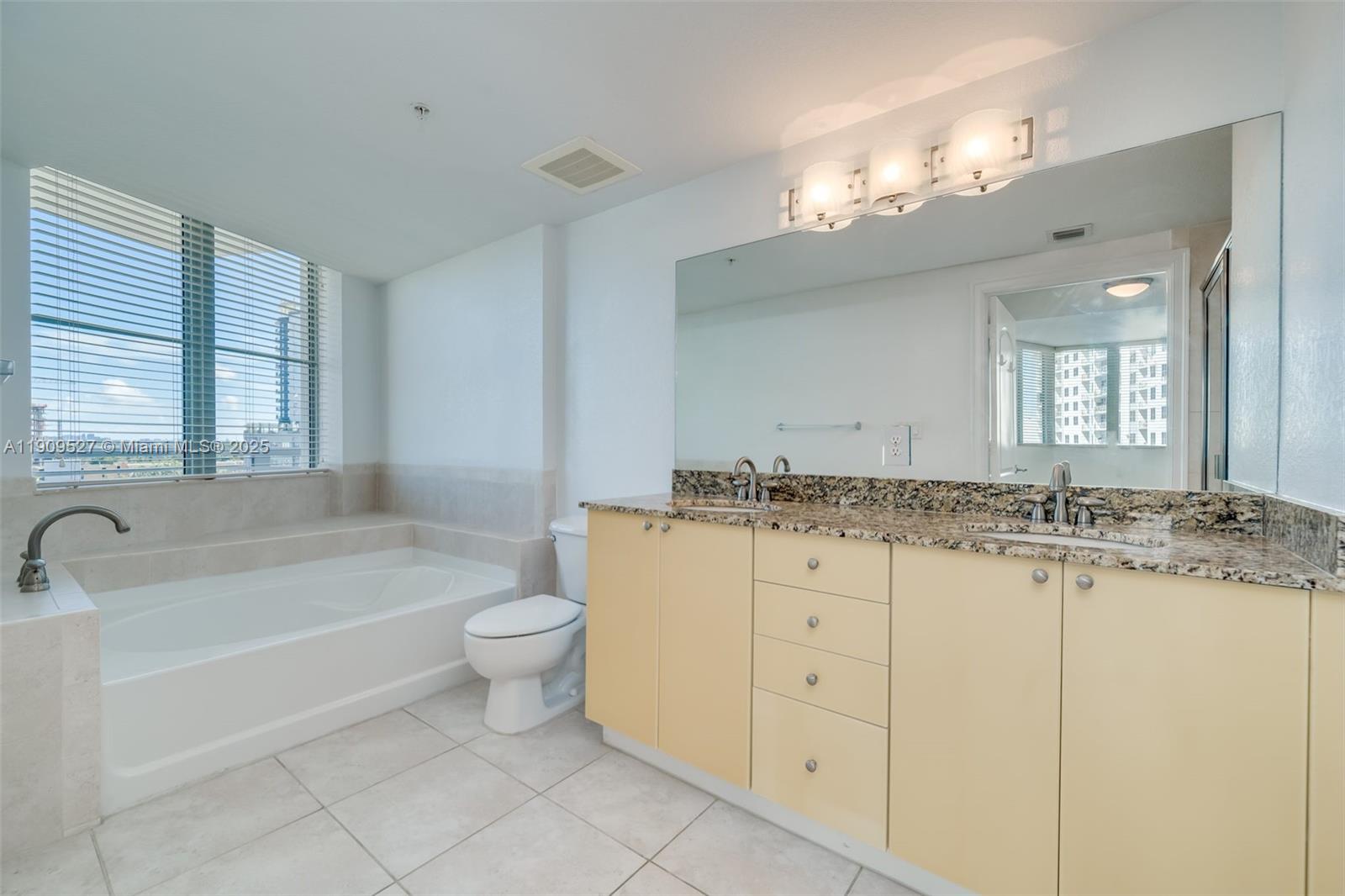 Photo of 1830 Radius Dr  #823, Hollywood, Florida, 33020 - large master bathroom with lots of storage