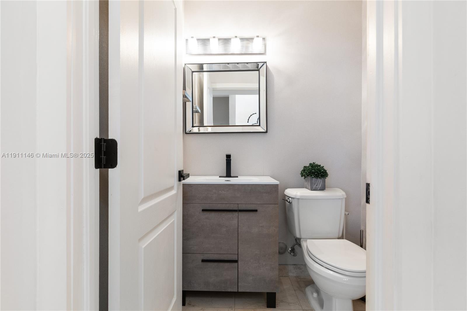 Photo of 18395 30th Ct (18395), Aventura, Florida, 33160 - Downstairs Guest Half Bath