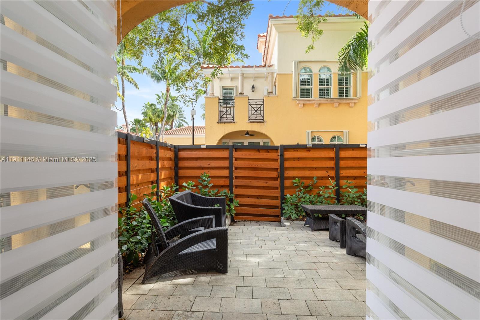 Photo of 18395 30th Ct (18395), Aventura, Florida, 33160 - Pavers, covered area, completely fenced in, and beautiful landscaping