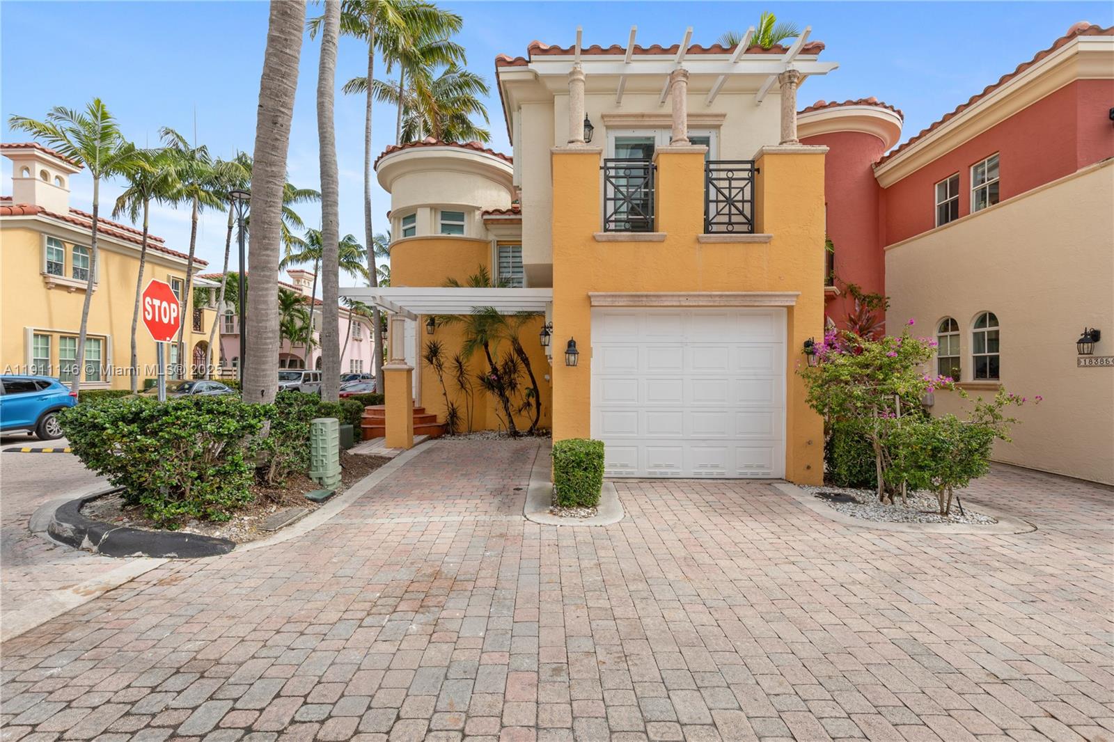Photo of 18395 30th Ct (18395), Aventura, Florida, 33160 - One car garage, parking in front of the townhome, steps from the pool. A wonderful community located across the street from a major park, Veterans Park. Steps from the community pool.