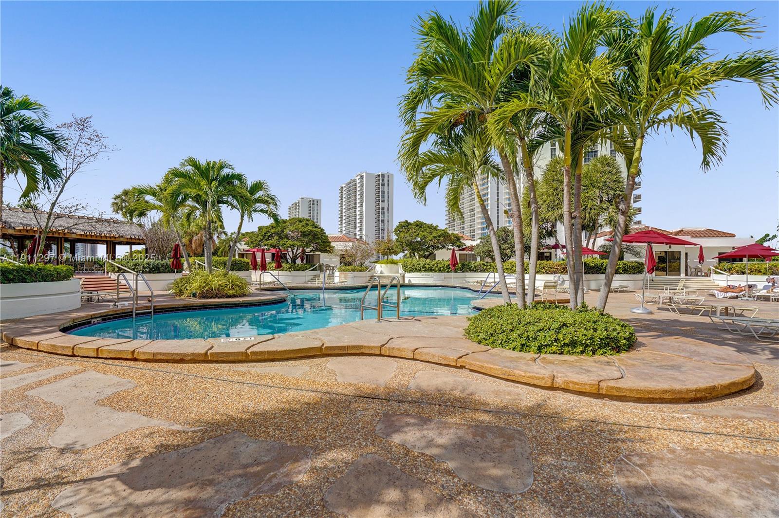 Photo of 20281 Country Club Dr  #511, Aventura, Florida, 33180 - Building pool.
