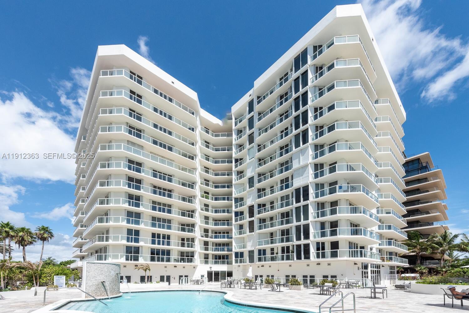 Photo of 8925 Collins Ave #11C, Surfside, Florida, 33154 - Aerial view of building from the beach.