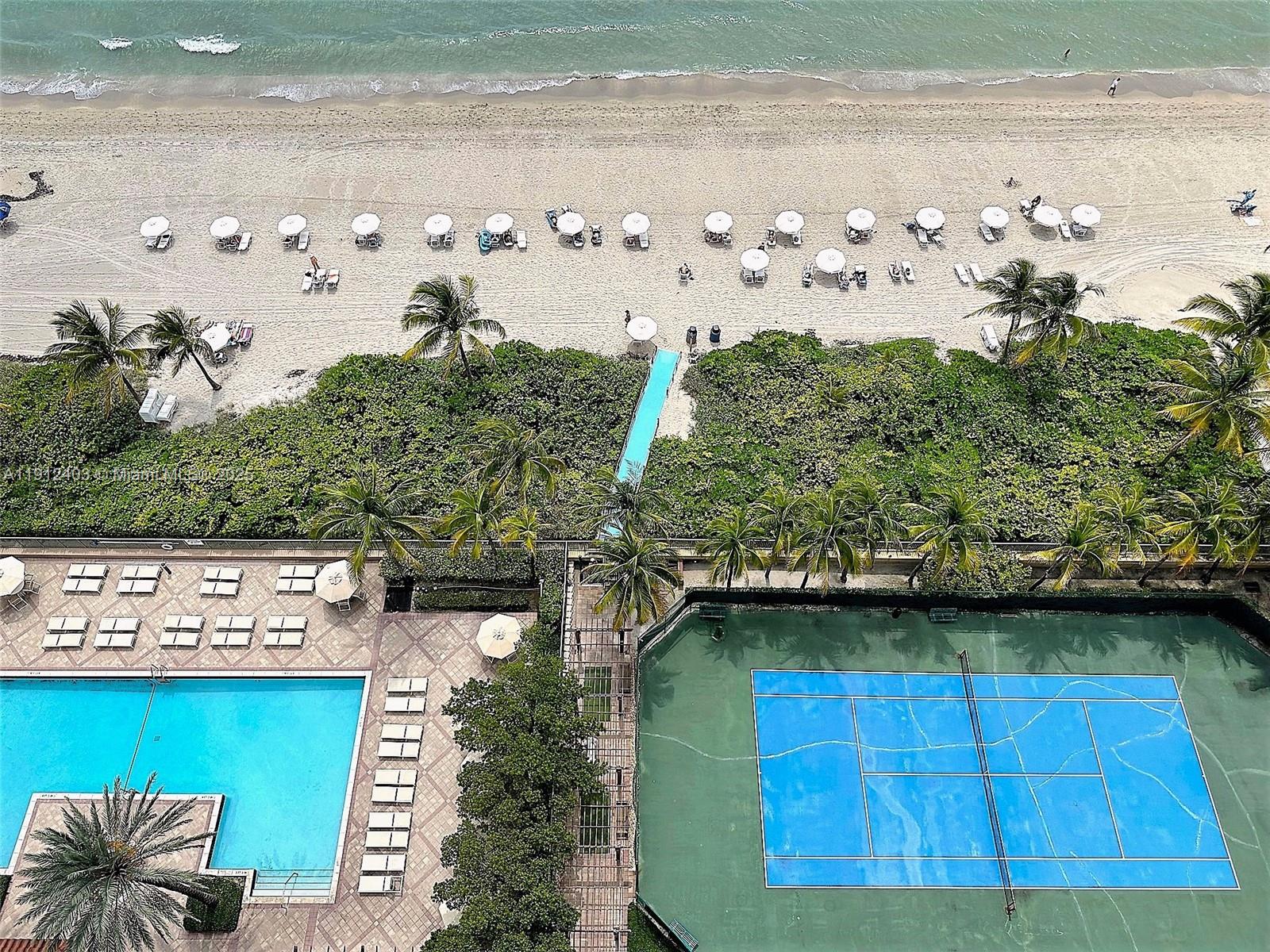 Photo of 2080 Ocean Dr #MPH12, Hallandale Beach, Florida, 33009 - Pool and Tennis Court