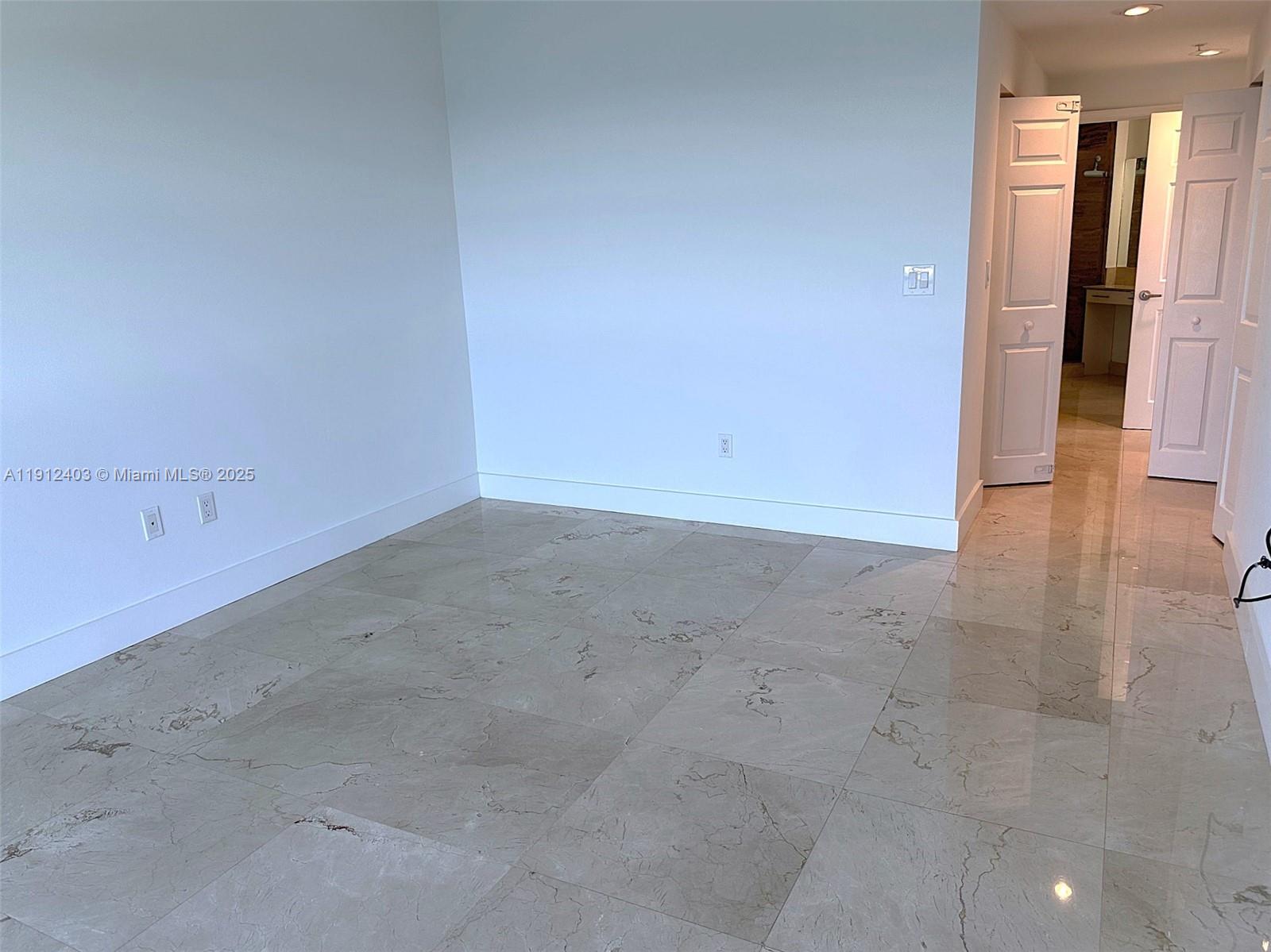Photo of 2080 Ocean Dr #MPH12, Hallandale Beach, Florida, 33009 - hallway to closets and bathroom