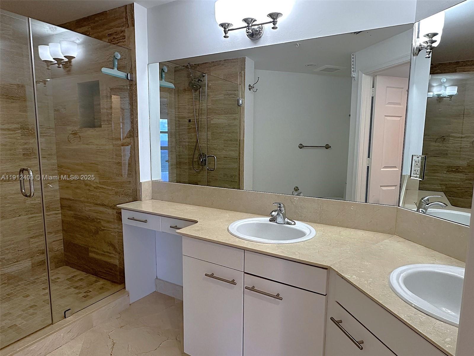 Photo of 2080 Ocean Dr #MPH12, Hallandale Beach, Florida, 33009 - Double sinks, shower