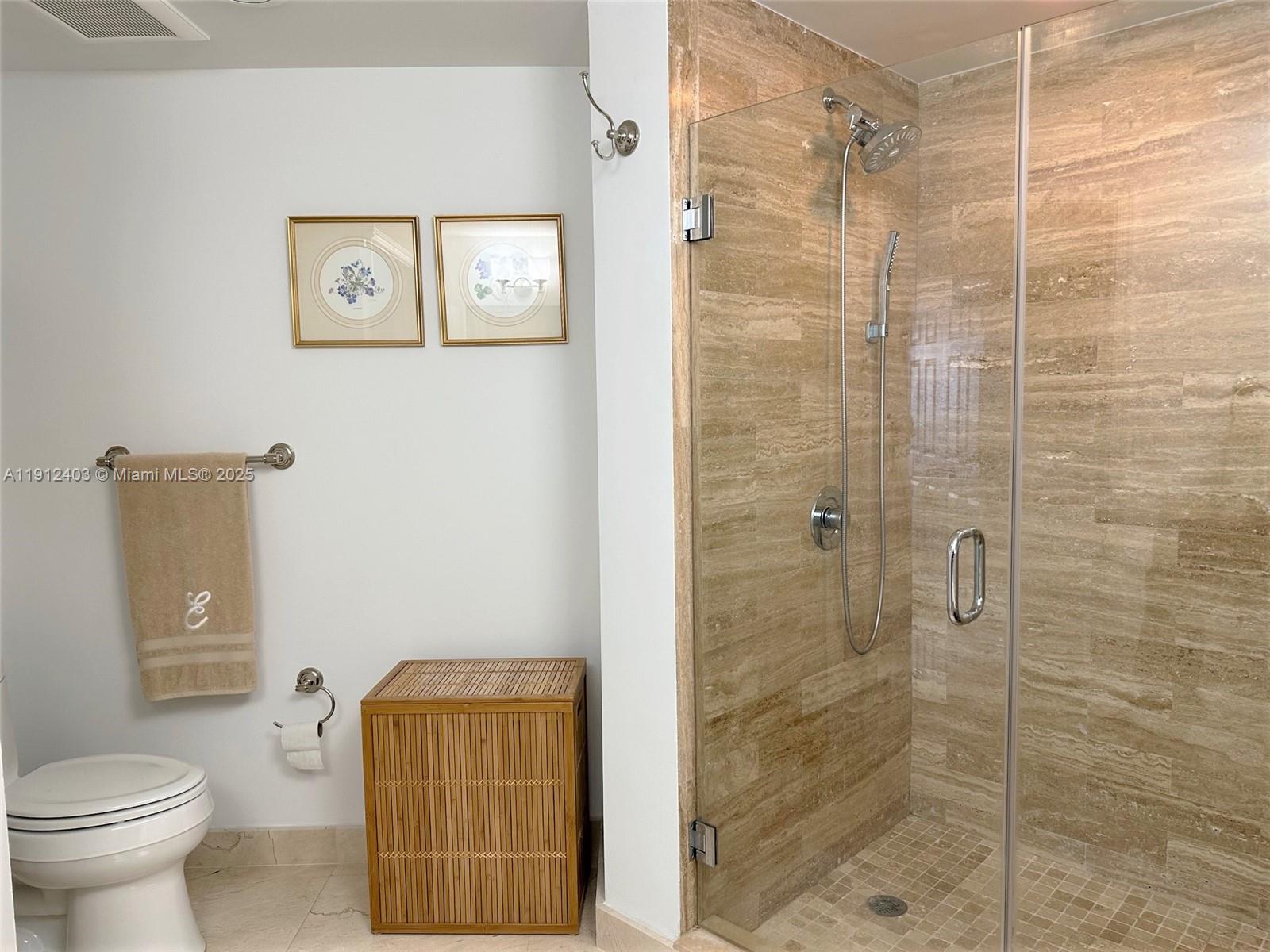 Photo of 2080 Ocean Dr #MPH12, Hallandale Beach, Florida, 33009 - Tiled shower with glass door