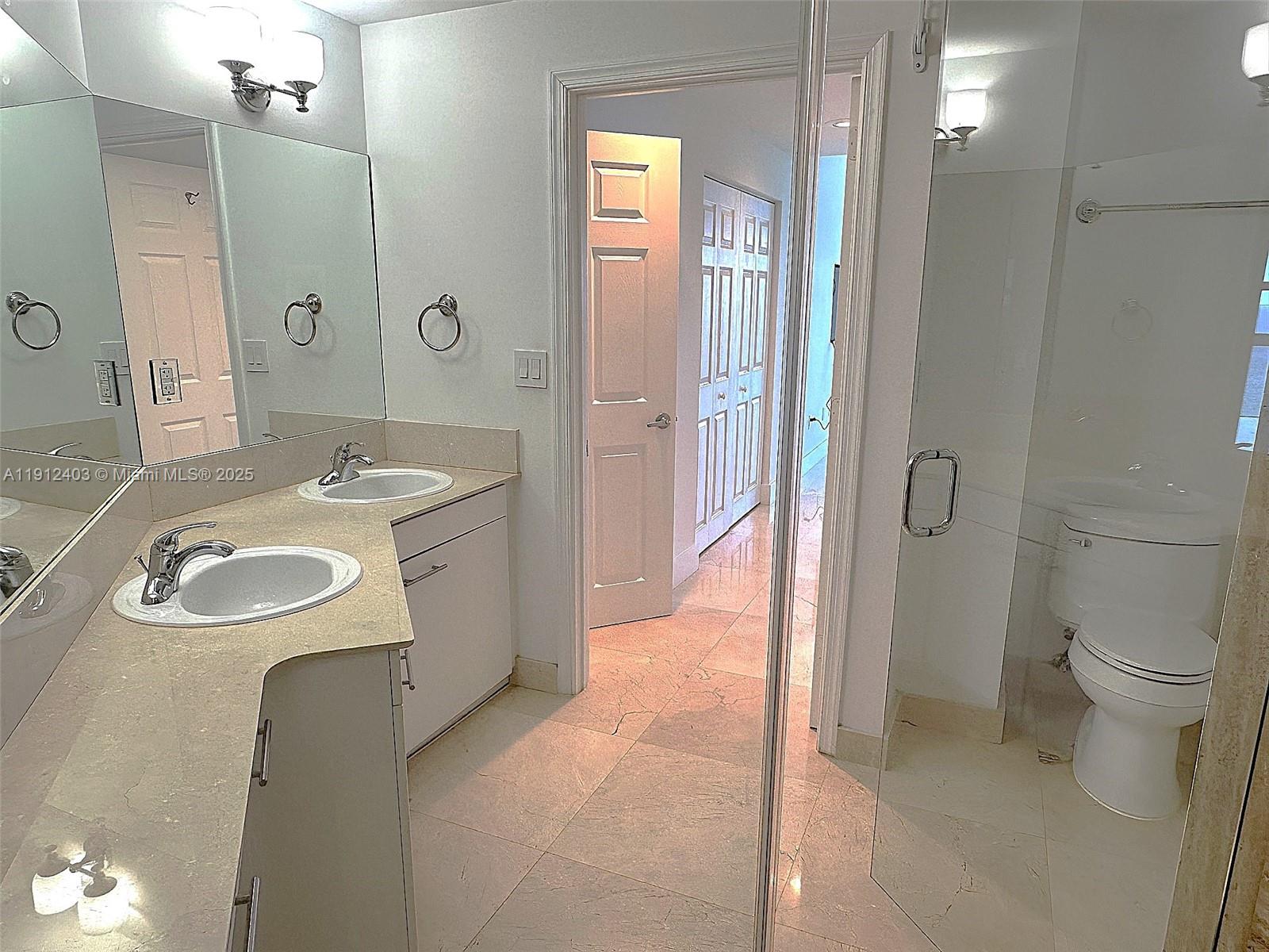 Photo of 2080 Ocean Dr #MPH12, Hallandale Beach, Florida, 33009 - Large bathroom with double sinks