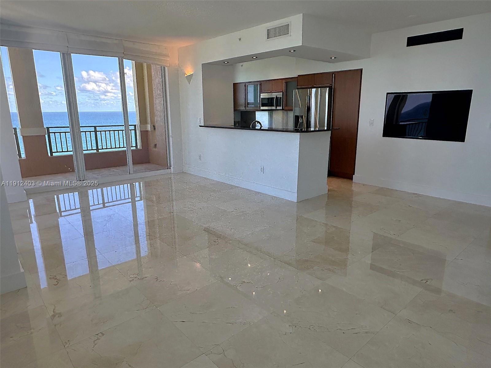 Photo of 2080 Ocean Dr #MPH12, Hallandale Beach, Florida, 33009 - Large living, dining and kitchen areas