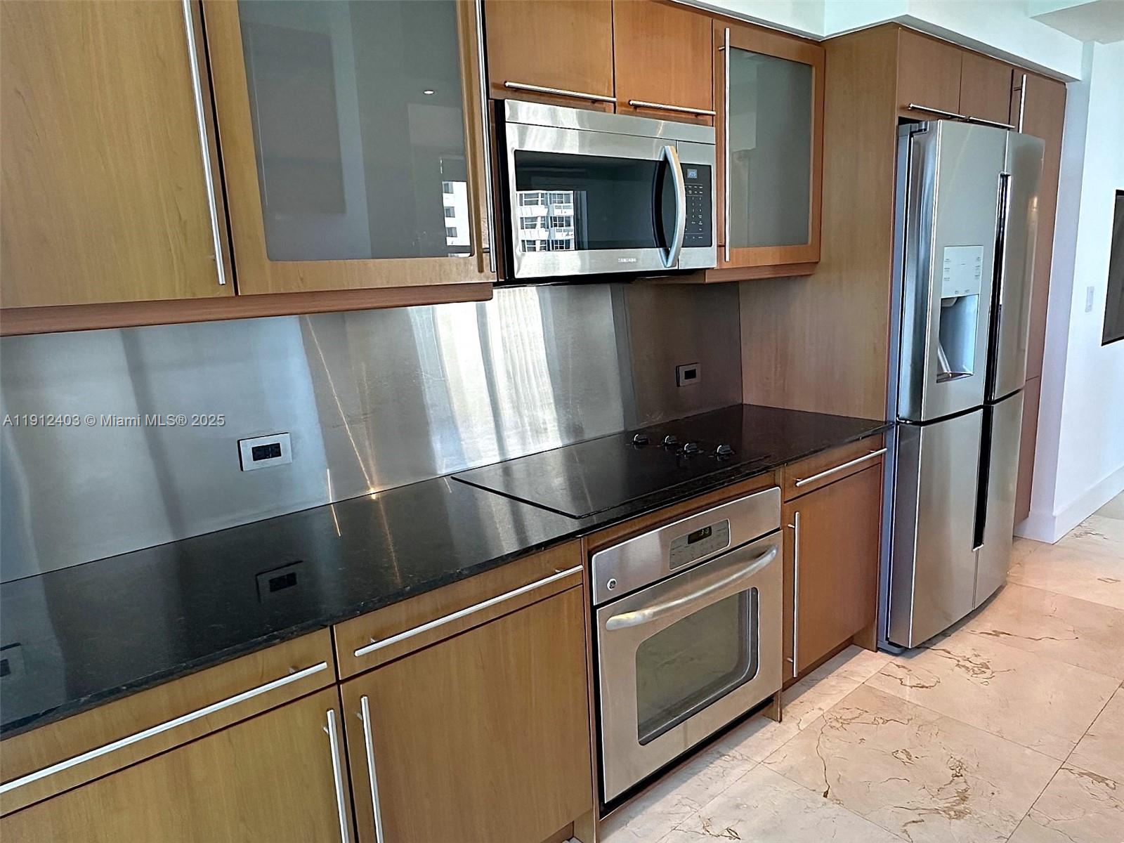 Photo of 2080 Ocean Dr #MPH12, Hallandale Beach, Florida, 33009 - Lots of cabinet space, long countertops and backsplash