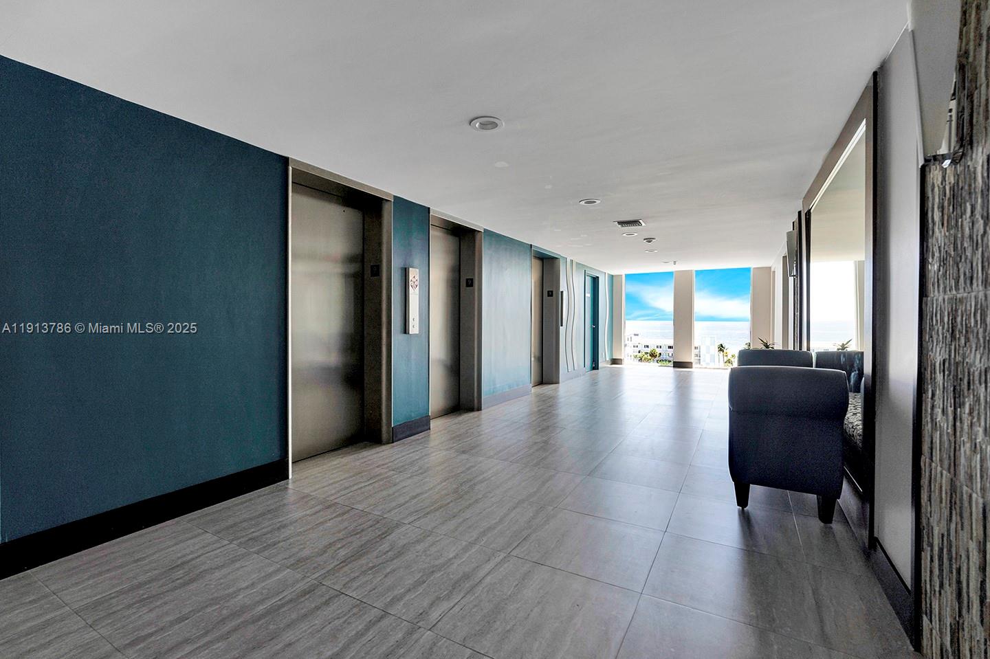Photo of 1500 Ocean DR #9J, Hollywood, Florida, 33019 - Hallway to 3 elevators