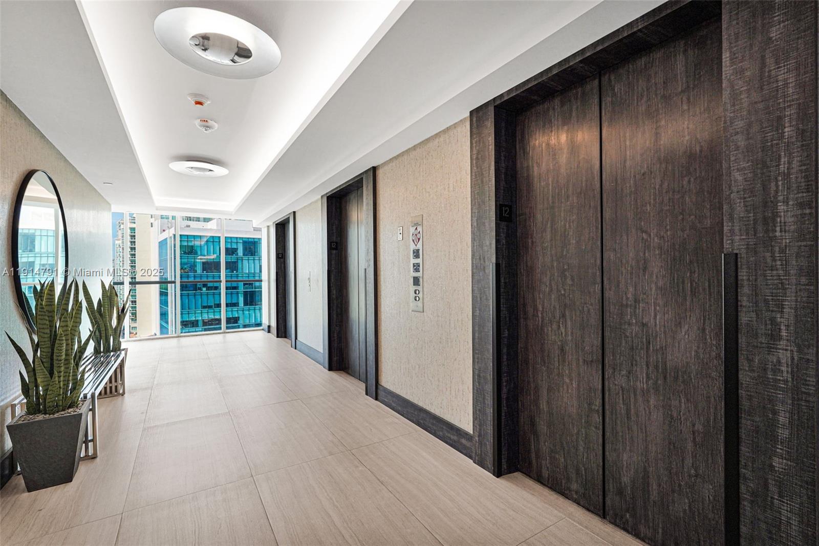 Photo of 16485 Collins Ave  #1236, Sunny Isles Beach, Florida, 33160 - unit's hallway to the elevator area