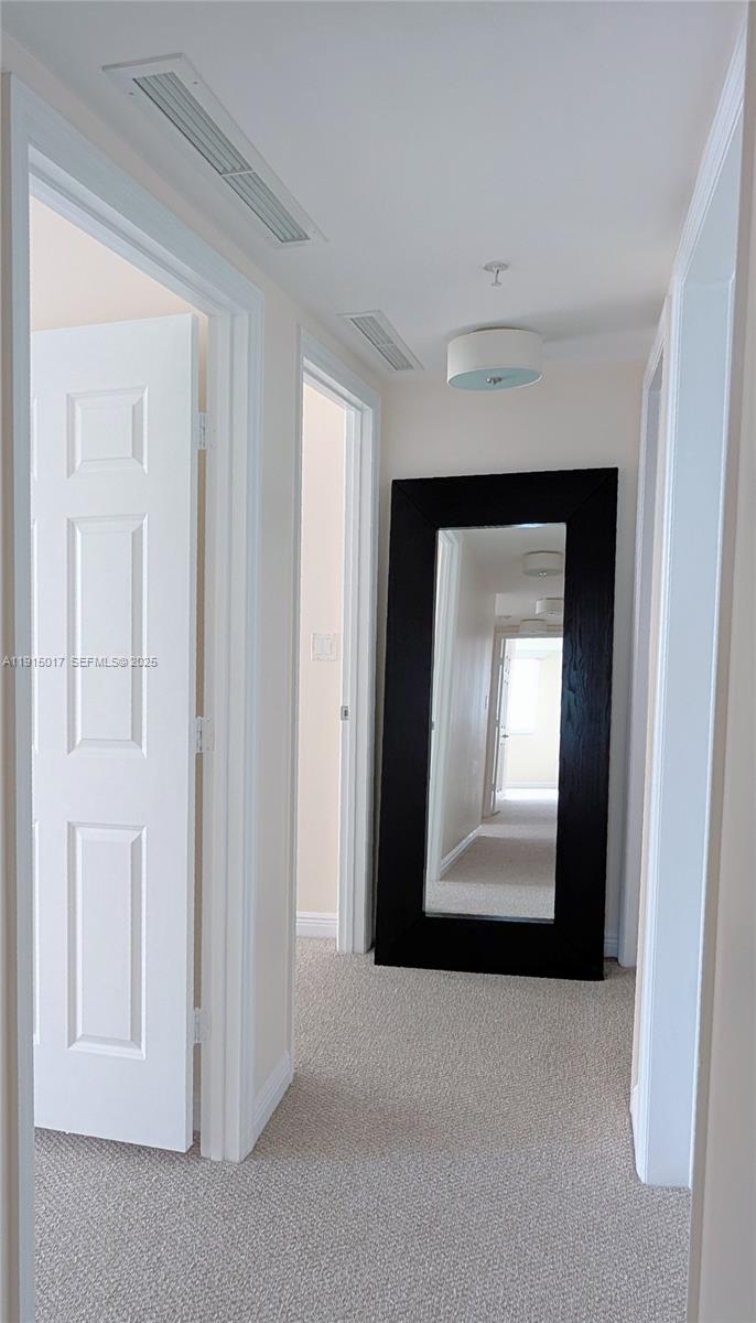 Photo of 1745 Hallandale Beach Blvd #1903W, Hallandale Beach, Florida, 33009 - hallway to 2nd and 3rd bedrooms