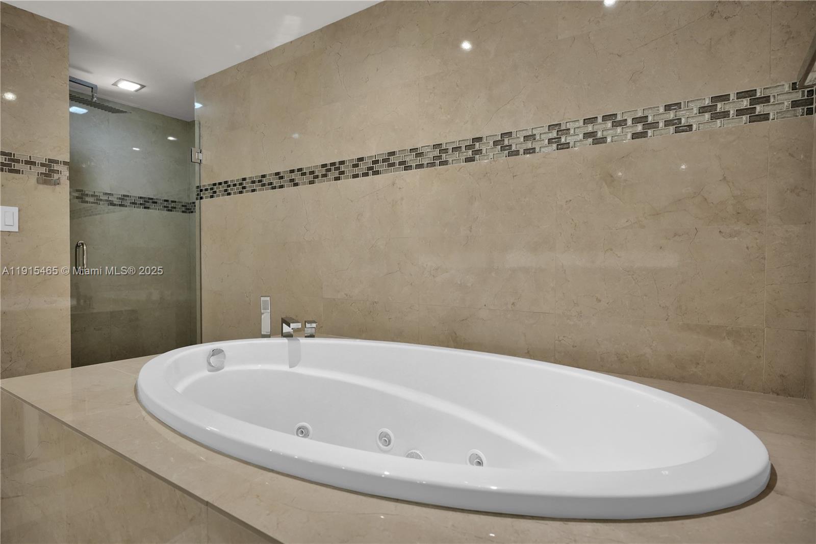 Photo of 10175 Collins Ave  #504, Bal Harbour, Florida, 33154 - Jacuzzi tub in master bath