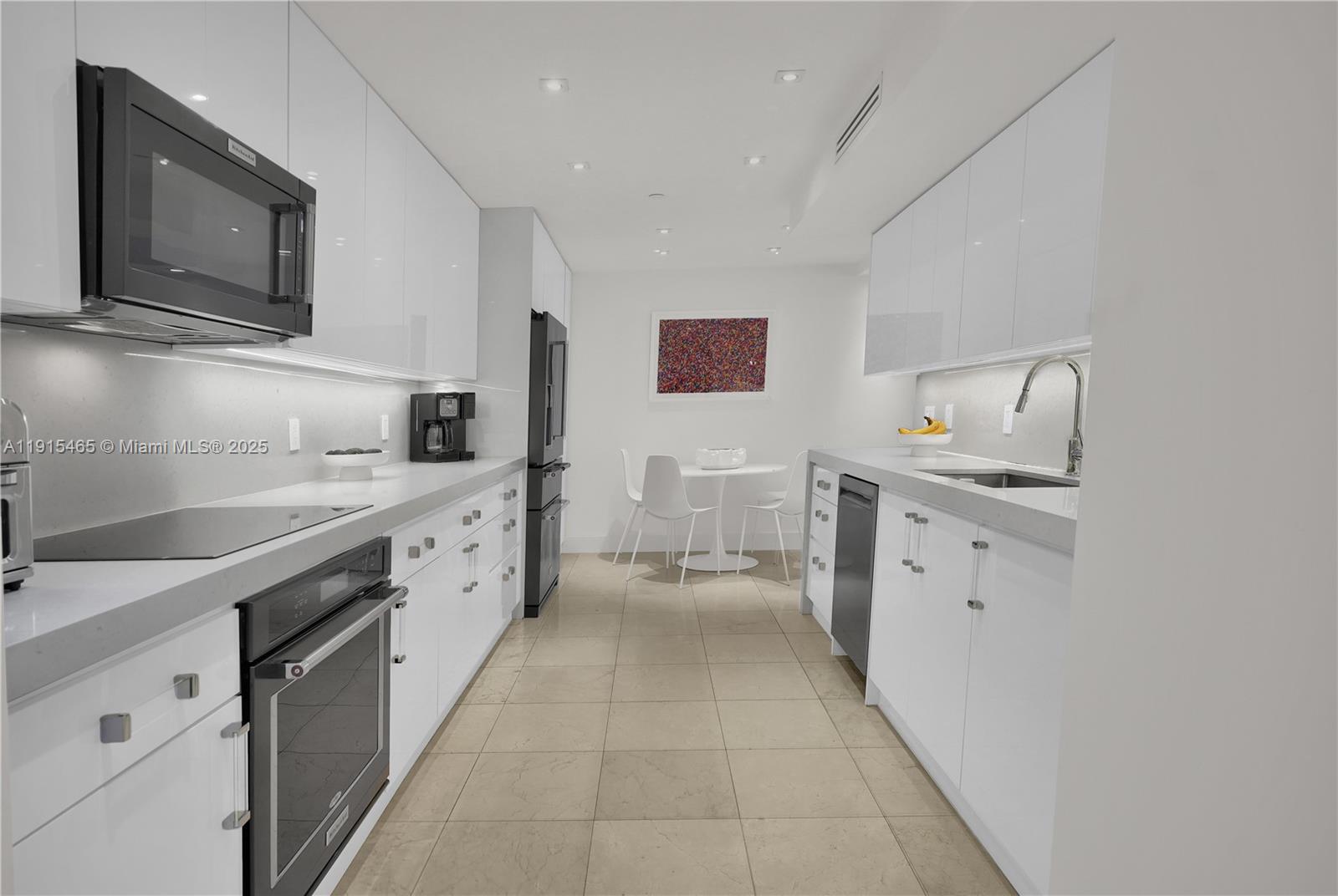 Photo of 10175 Collins Ave  #504, Bal Harbour, Florida, 33154 - Beautifully remodeled kitchen.