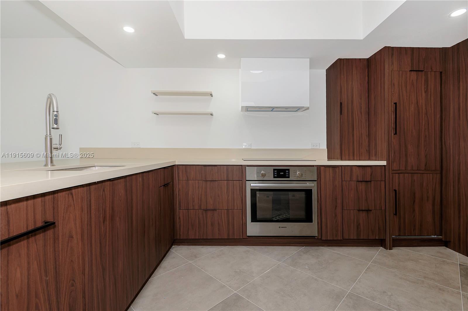 Photo of 8855 Collins Ave  #6E, Surfside, Florida, 33154 - New, open kitchen to Living Room