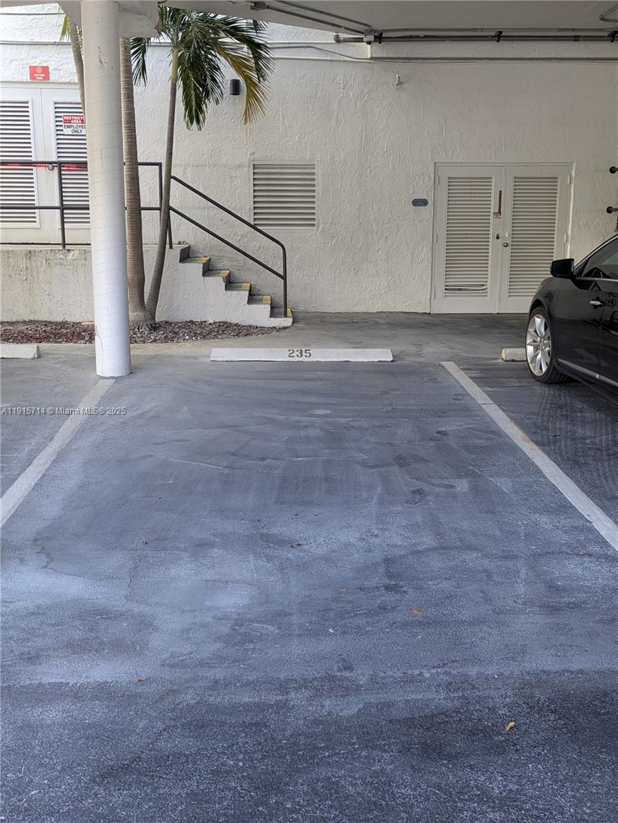 Photo of 300 Three Islands Blvd #414, Hallandale Beach, Florida, 33009 - covered spot close to entrance