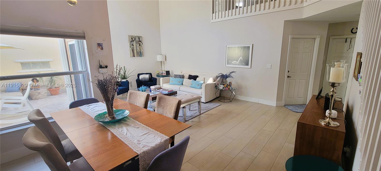 Photo of 1055 Yellow Birch Ter  (1055), Hollywood, Florida, 33019 - Two story ceiling dining room