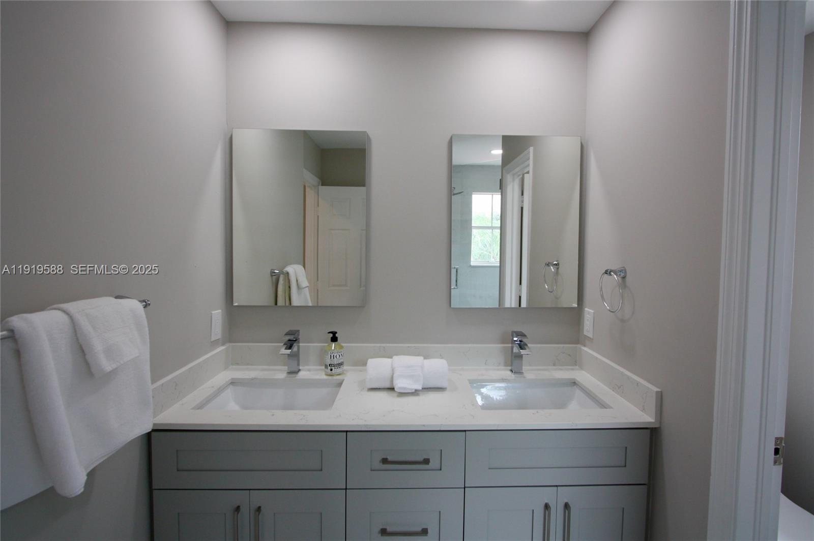 Photo of 935 Lemonwood Ct  (935), Hollywood, Florida, 33019 - Remodeled Primary Bath with Dual Vanity