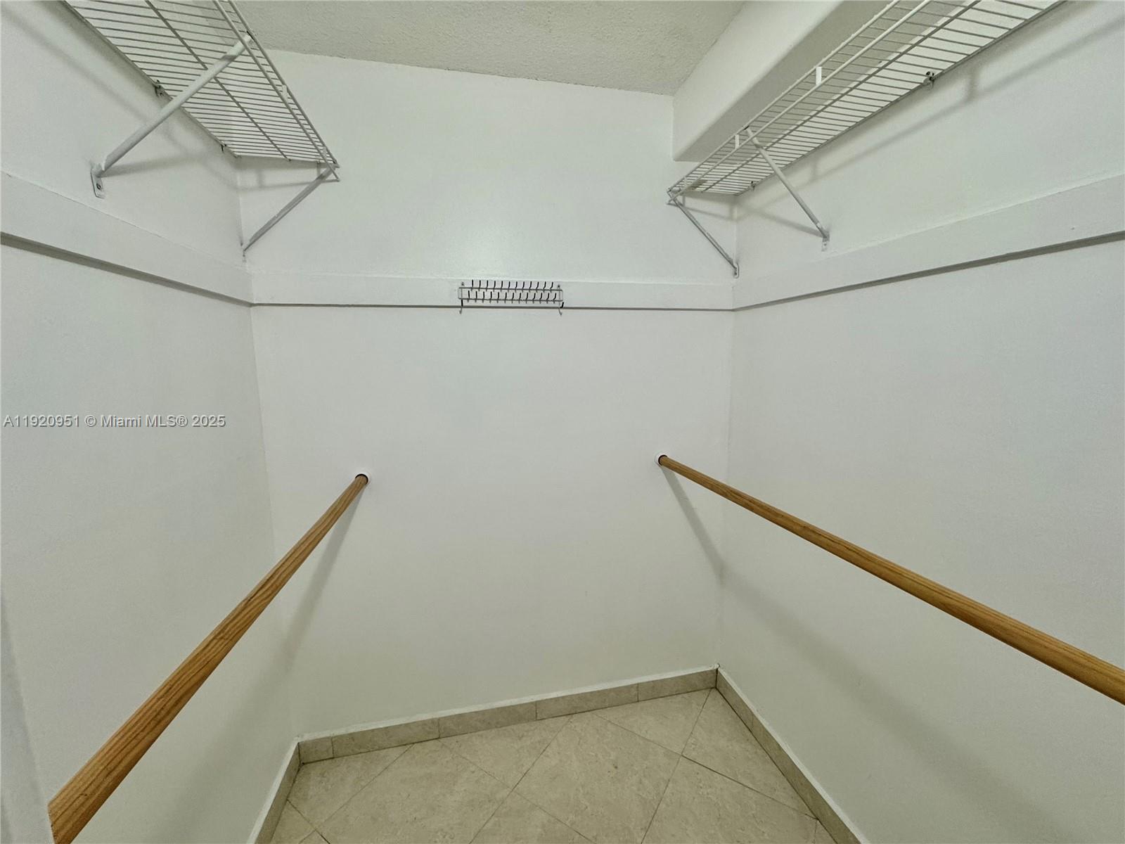 Photo of 400 Kings Point Dr  #411, Sunny Isles Beach, Florida, 33160 - Master Walk-in Closet