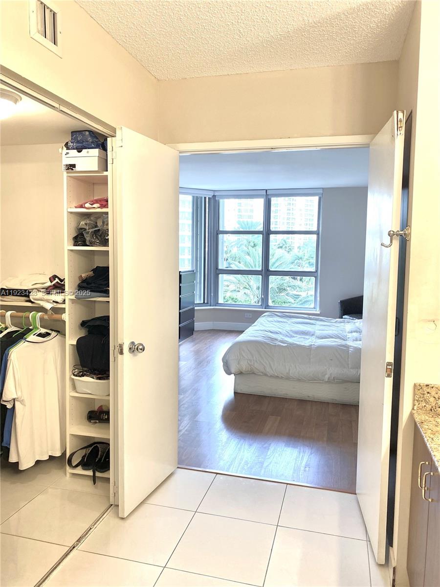 Photo of 19195 36th Ct #402, Aventura, Florida, 33180 - Doble door entrance to bathroom