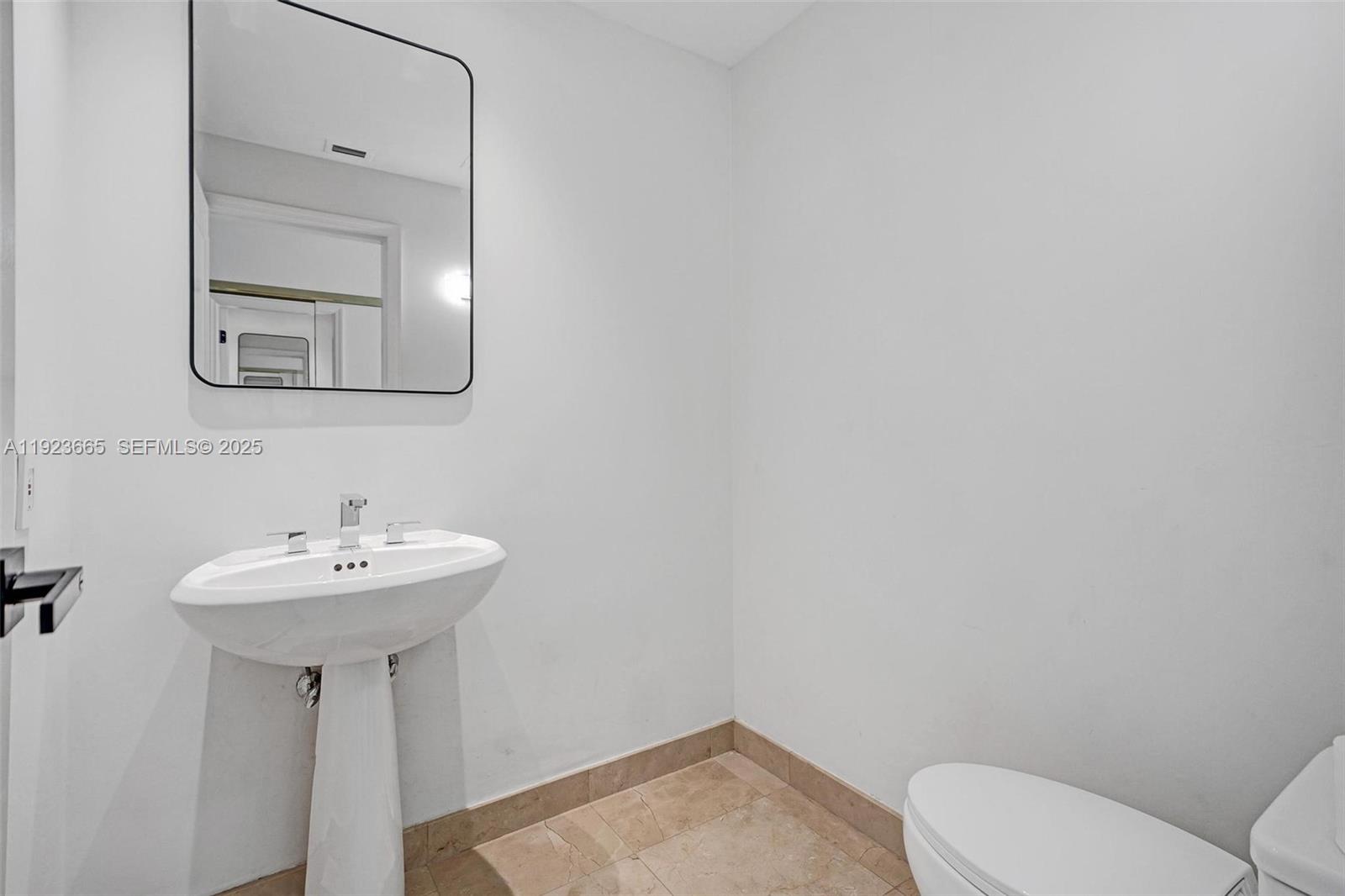 Photo of 10101 Collins Ave  #17A, Bal Harbour, Florida, 33154 - Half Bathroom