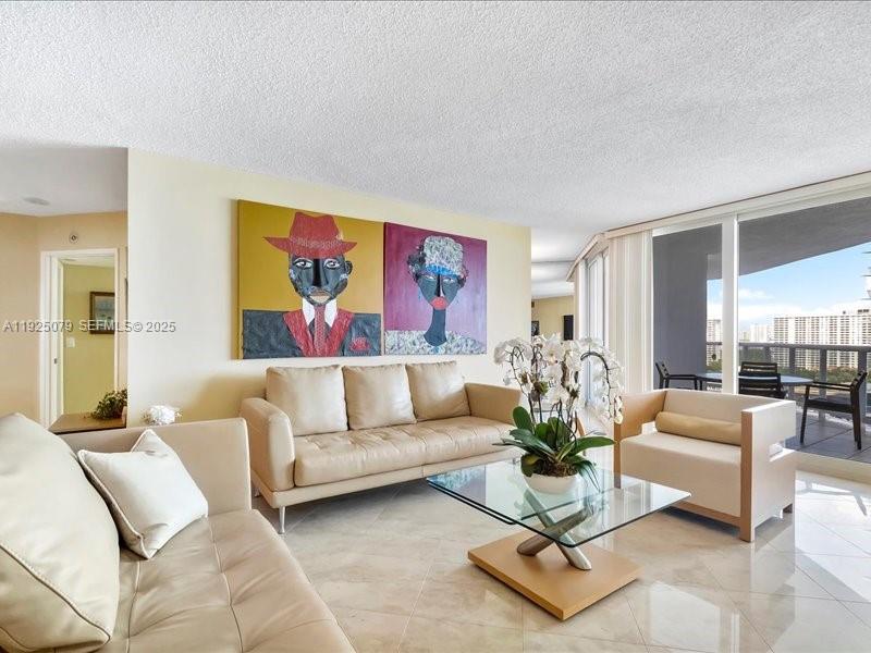 Photo of 16711 Collins Ave  #1604, Sunny Isles Beach, Florida, 33160 - Living room with views West, north and east