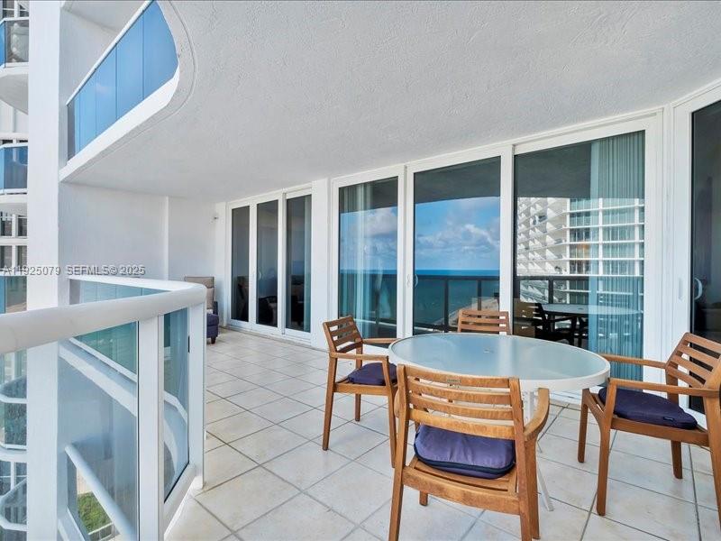 Photo of 16711 Collins Ave  #1604, Sunny Isles Beach, Florida, 33160 - Large balcony overlooking the beach