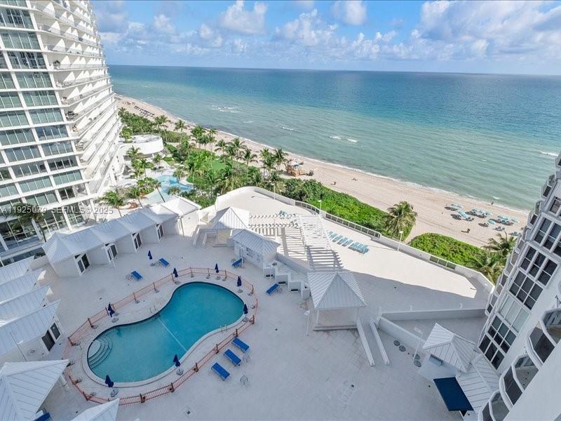 Photo of 16711 Collins Ave  #1604, Sunny Isles Beach, Florida, 33160 - Pool deck overlooking the beach