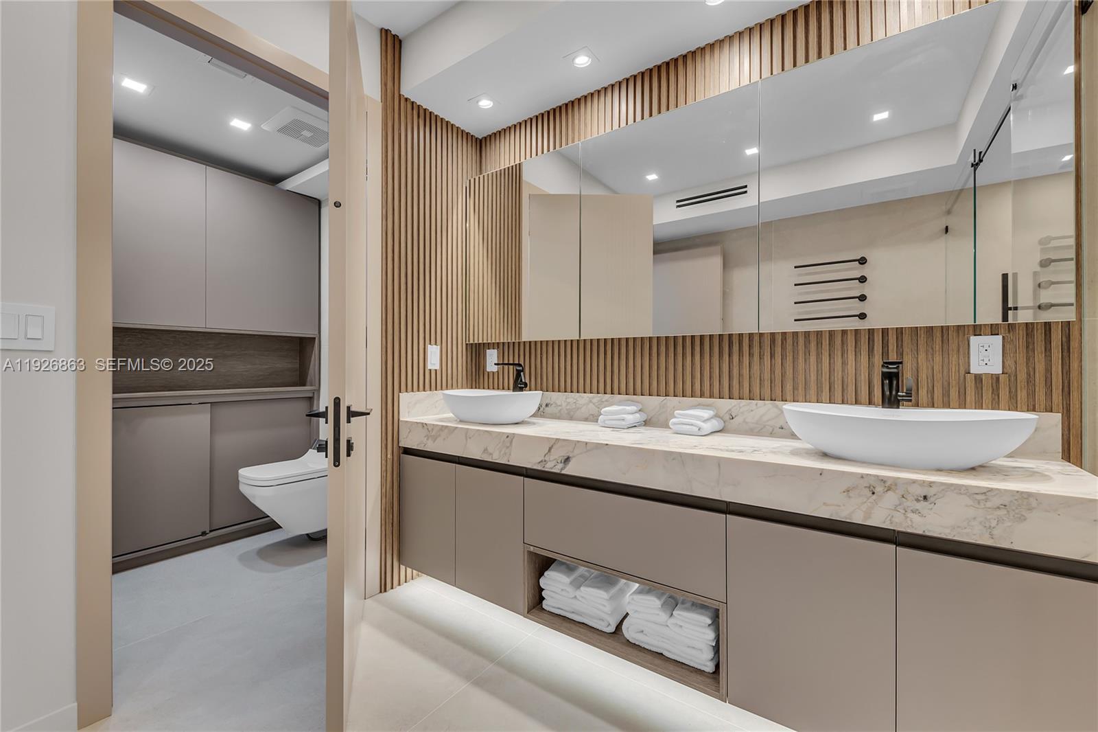 Photo of 3535 Ocean Dr  #1003, Hollywood, Florida, 33019 - MASTER BATHROOM WITH SEPARATE TOILET ROOM