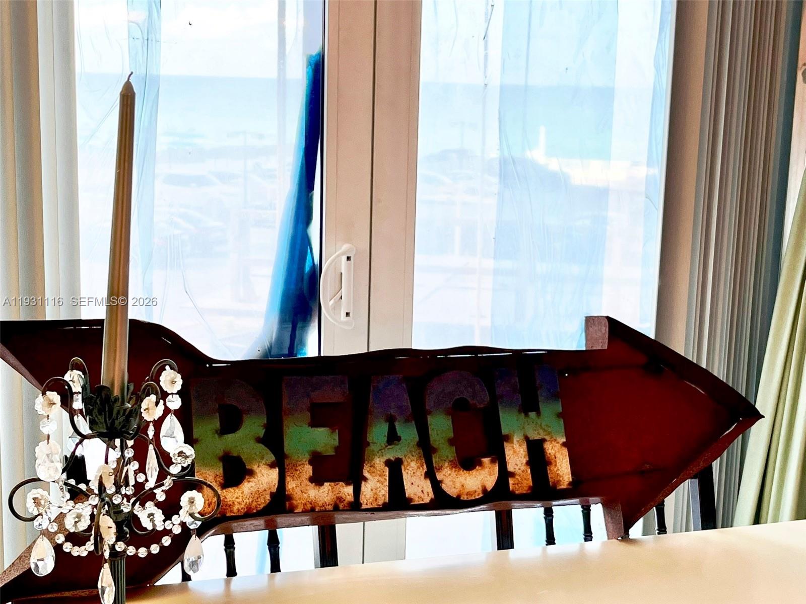 Photo of 3180 Ocean Dr  #204, Hallandale Beach, Florida, 33009 - ththrough the temporary window plastic