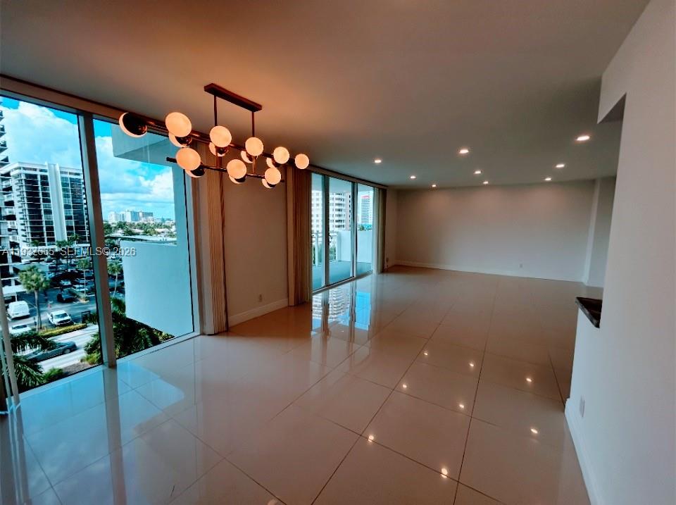 Photo of 2030 Ocean Dr  #506, Hallandale Beach, Florida, 33009 - floor to ceiling hurricane impact windows / dining - living room