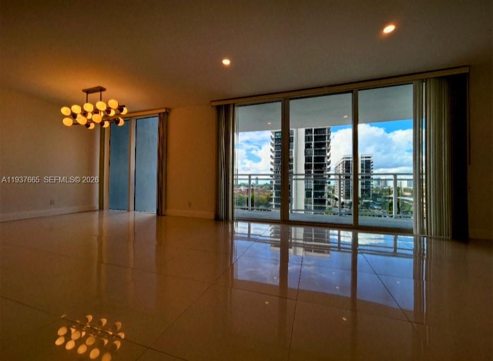 Photo of 2030 Ocean Dr  #506, Hallandale Beach, Florida, 33009 - contemporary open form kitchen with overhead recessed lights and designer finishes and features