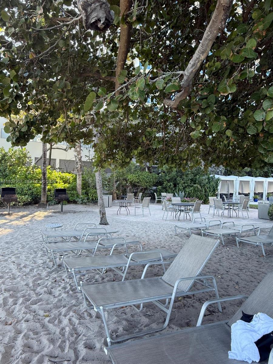 Photo of 3001 Ocean Dr #107, Hollywood, Florida, 33019 - Patio area with beach access.