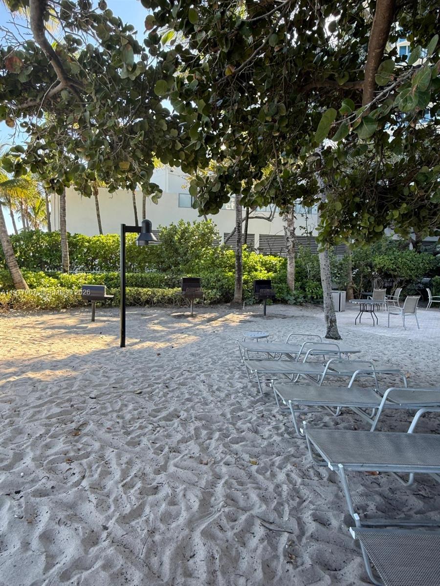 Photo of 3001 Ocean Dr #107, Hollywood, Florida, 33019 - Patio area with beach access.