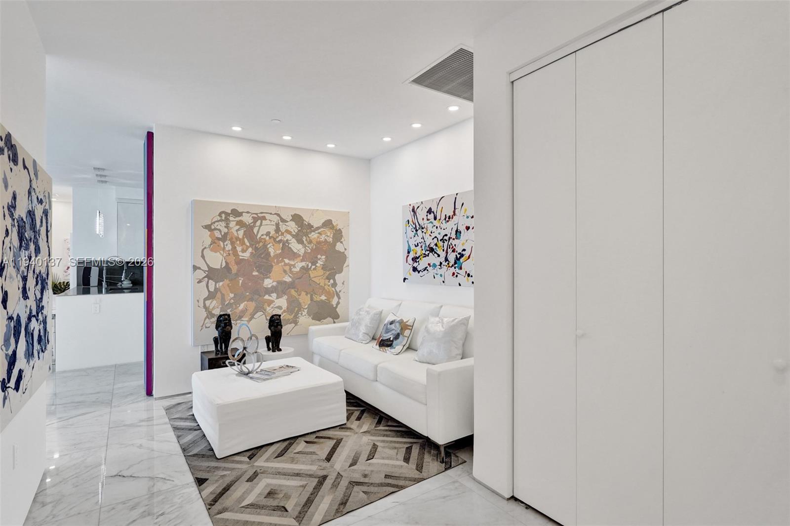 Photo of 17475 Collins Ave  #2502, Sunny Isles Beach, Florida, 33160 - Den space with closet by front entrance