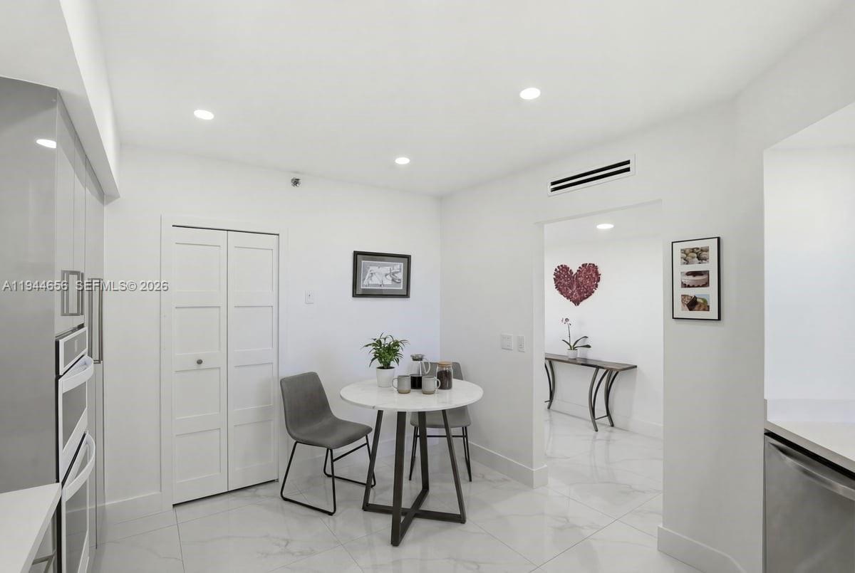 Photo of 8925 Collins Ave  #9F, Surfside, Florida, 33154 - Breakfast area - virtual staging