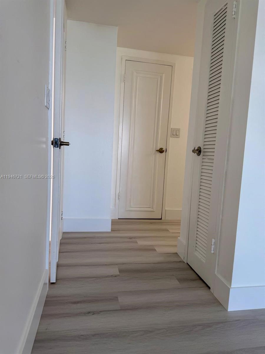 Photo of 3725 Ocean Dr #1116, Hollywood, Florida, 33019 - MASTER BEDROOM TO CLOSET & BATHROOM