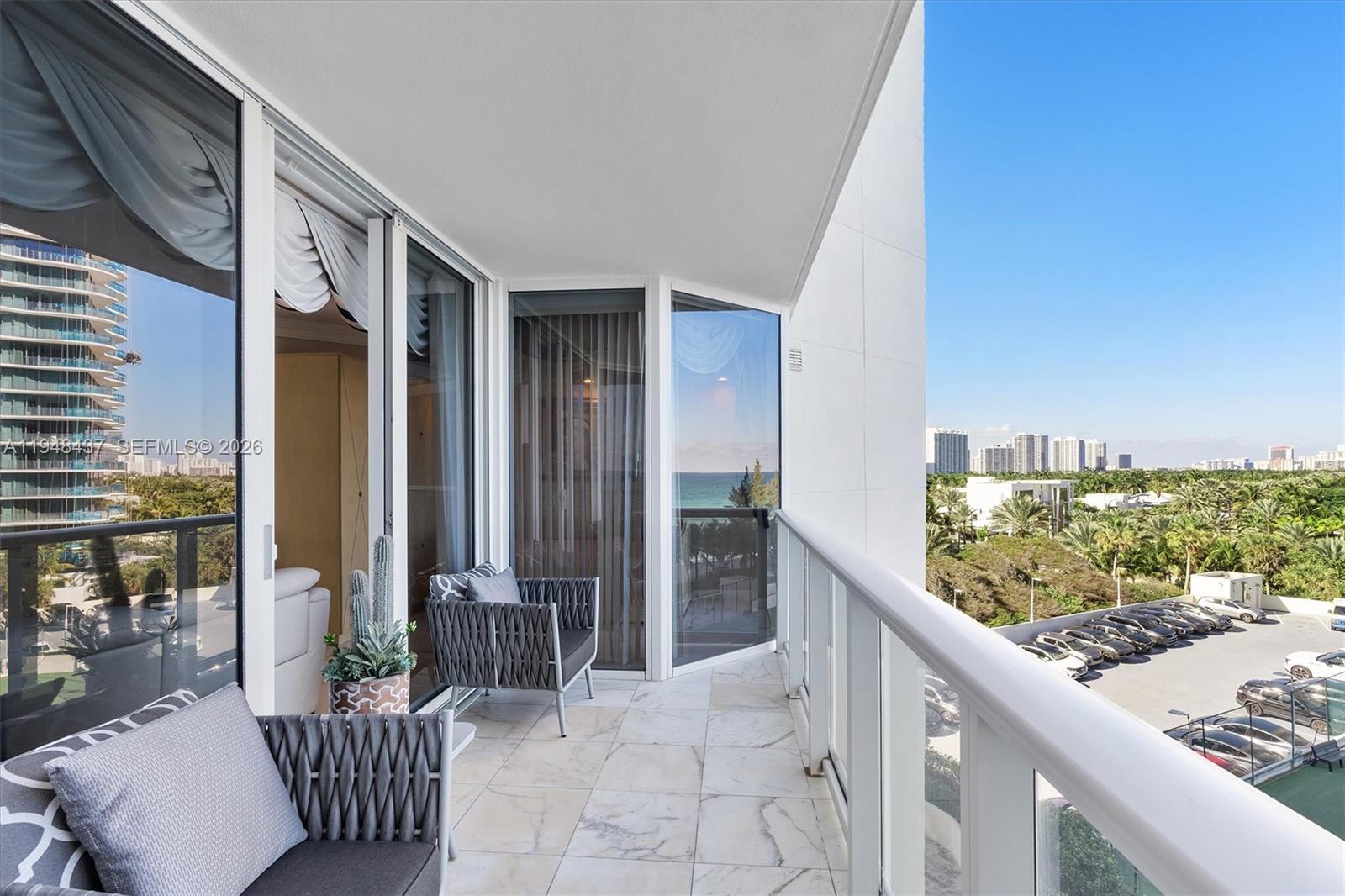 Photo of 19333 Collins Ave  #703, Sunny Isles Beach, Florida, 33160 - East Facing Balcony
