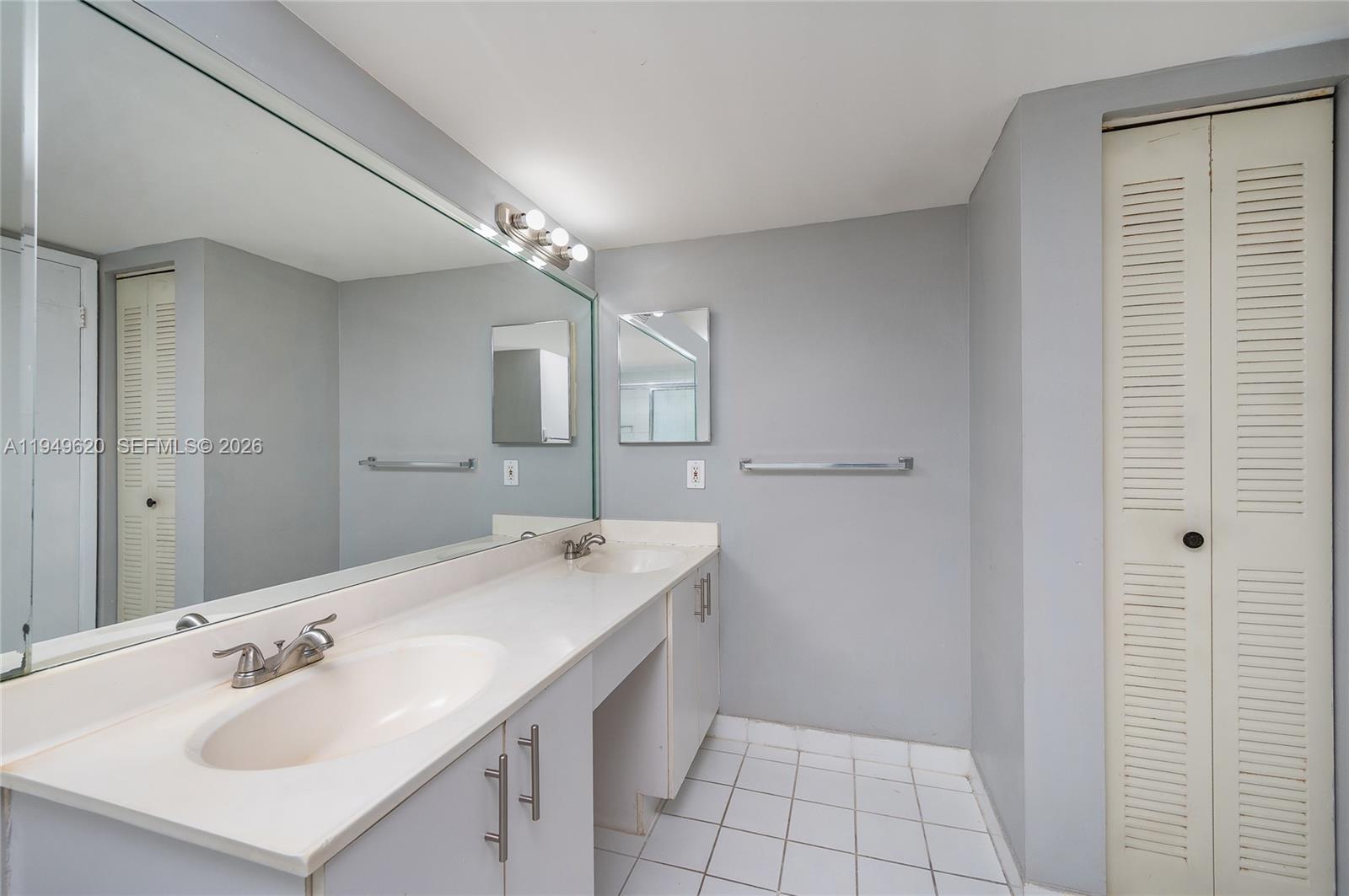 Photo of 3300 191st St  #1915, Aventura, Florida, 33180 - Principal bathroom - double sink, shower